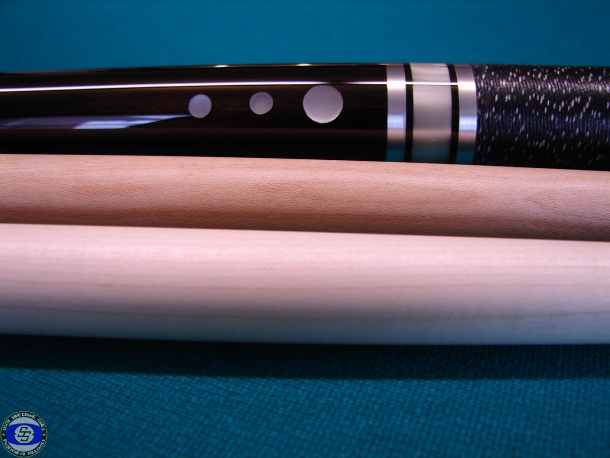 Ebony and mother of pearl Rich cue
